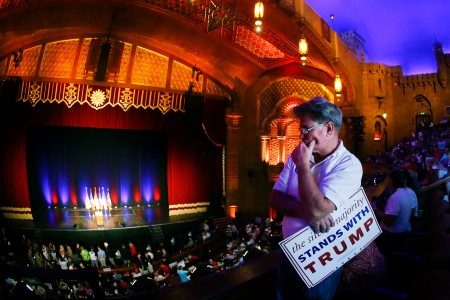 Tim Youngblood of Dahlonega, Ga. waits for Republican presidential candidate Donald Trump to arrive for a rally at the Fox Theater, Wednesday, June 15, 2016, in Atlanta. (AP Photo/John Bazemore)